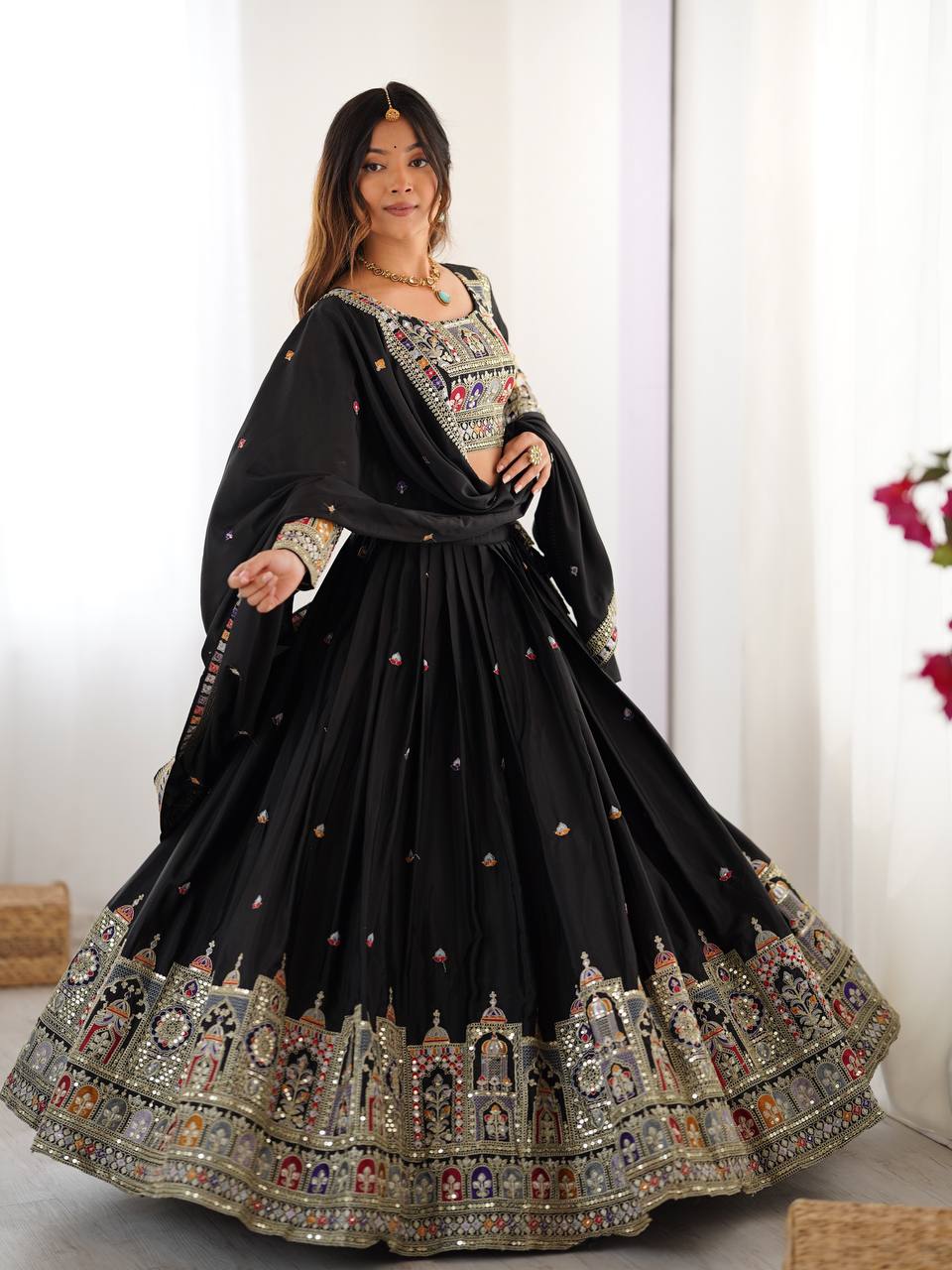 Majestic Midnight Black Designer Lehenga Choli Featuring Intricate Multicolored Architectural Embroidery and Mirror Work
